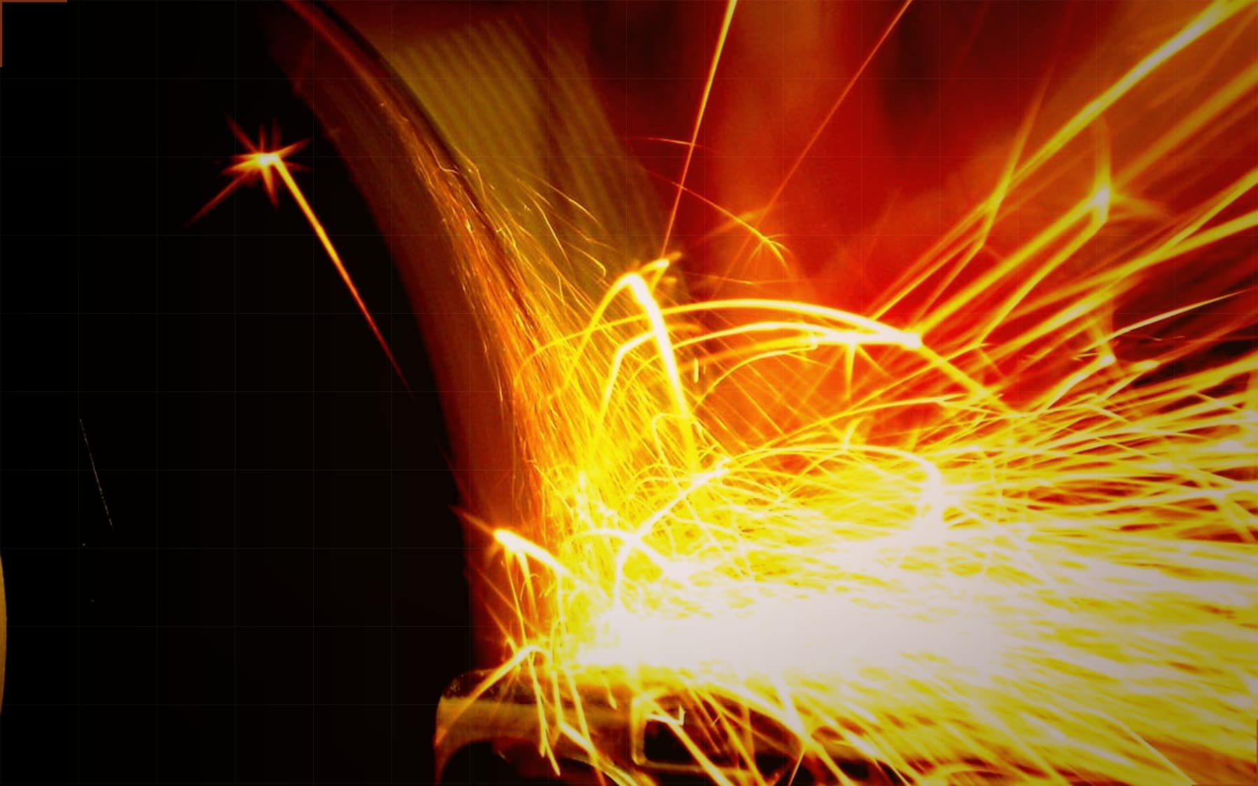Sparks from a metal grinding operation